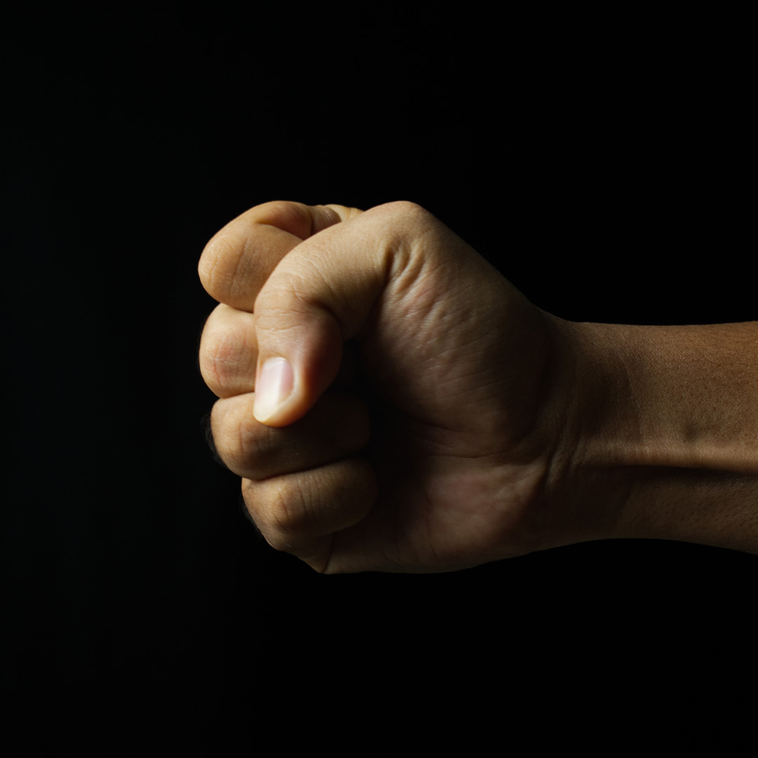 Close-up of a clenched fist.