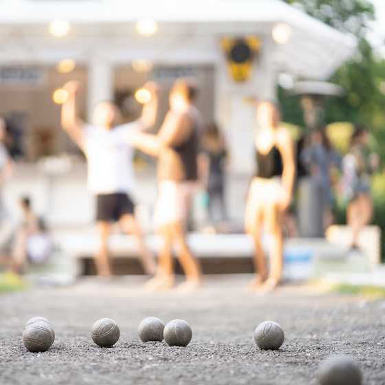 The first team/player to score 13 points wins a game of pétanque.
