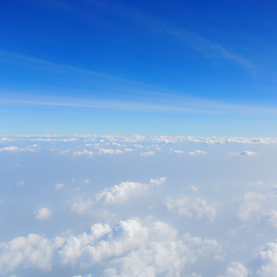 The closest layer to Earth's surface is called the troposphere and it contains 75% of the entire mass of the atmosphere.