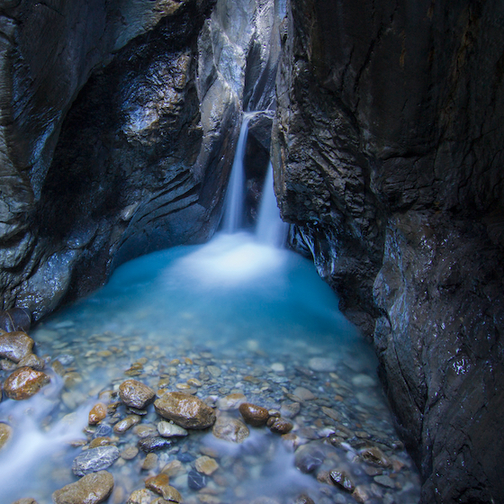 As much as 1,000 L (265 gallons) of water flow over the Trümmelbach falls per second.