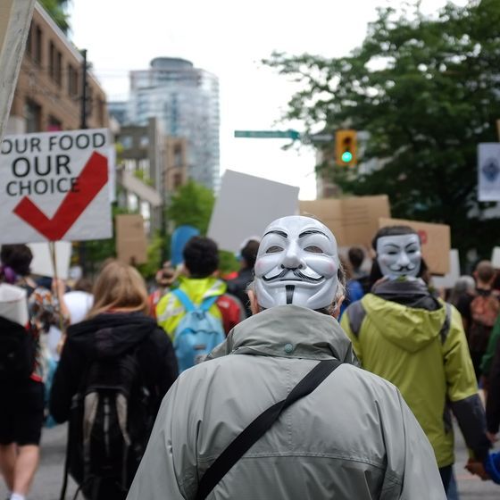 Holding a meeting or demonstration while wearing a mask, hood or other costume is against the law in North Carolina.