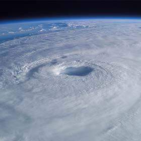 A tropical storm becomes a hurricane when wind speed exceeds 74 mph (119 km/h).