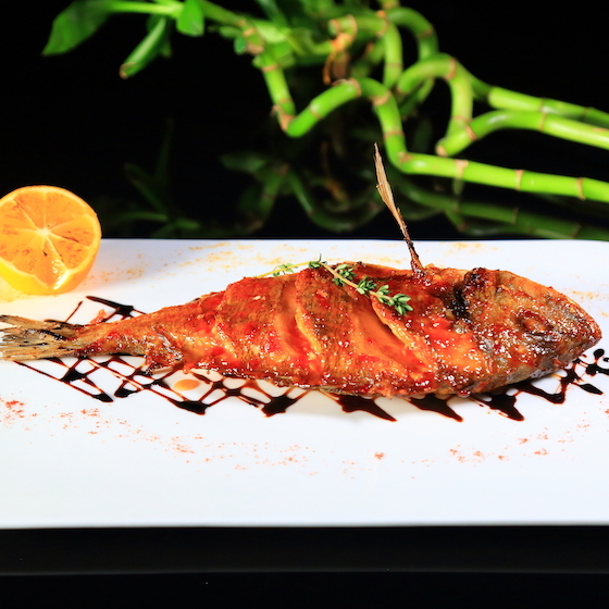 Serving fish at the New Year is a sign of abundance.