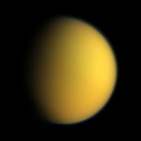 Titan, one of the moons of Saturn, has lakes of liquid hydrocarbons on its surface.
