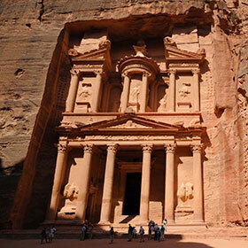 The city of Petra is located in the Egyptian Desert, near the Pyramids of Giza.